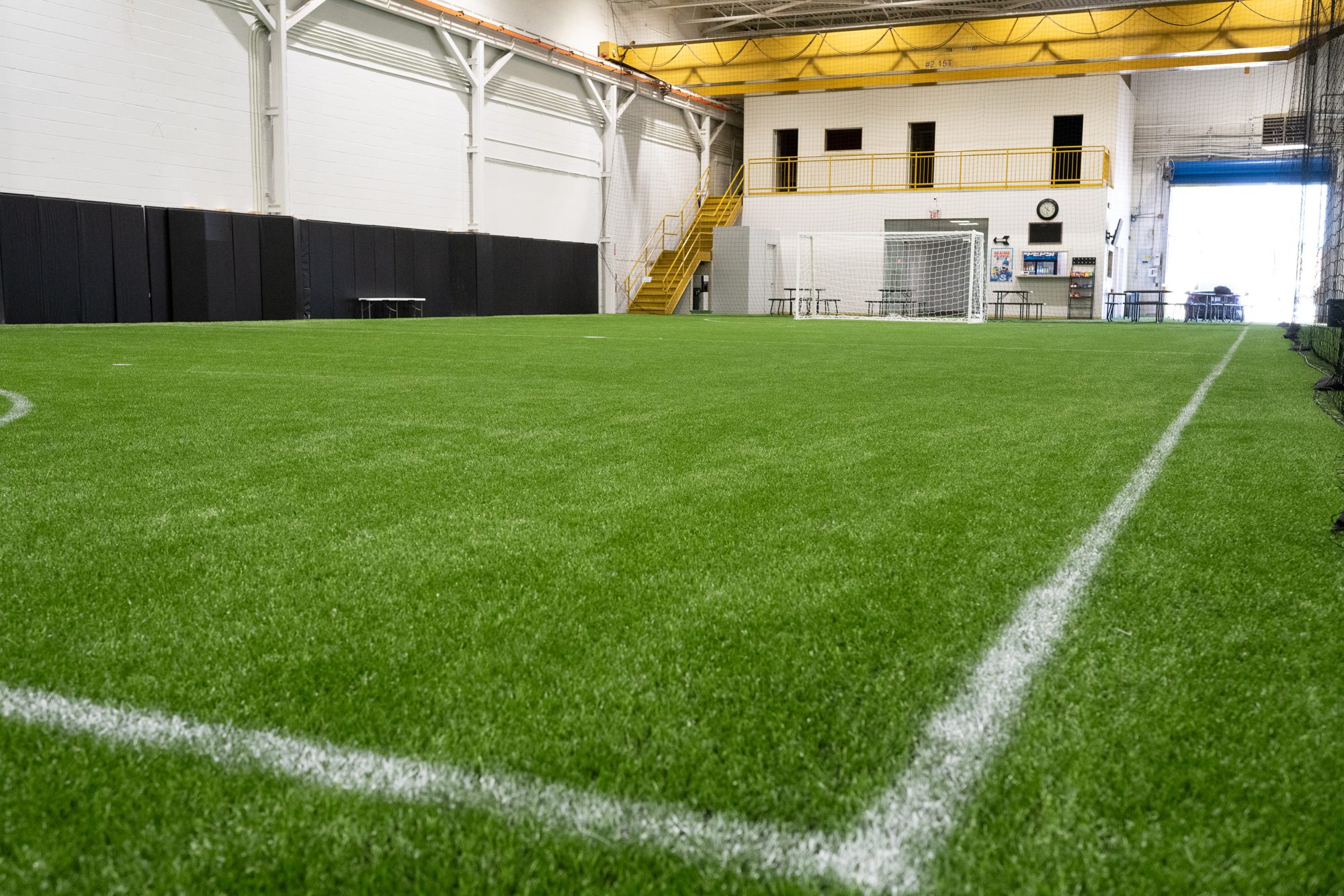 Turf field and mezzanine viewing area at 360 Doughton